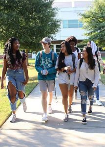 Several students walking on campus